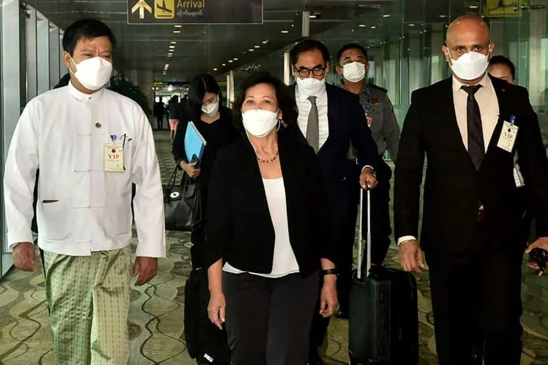 The UN's special envoy for Myanmar, Noeleez Heyzer, walks with high-level officials after her arrival in Yangon for her first visit, on August 16, 2022 The UN's special envoy for Myanmar, Noeleez Heyzer, walks with high-level officials after her arrival in Yangon for her first visit, on August 16, 2022