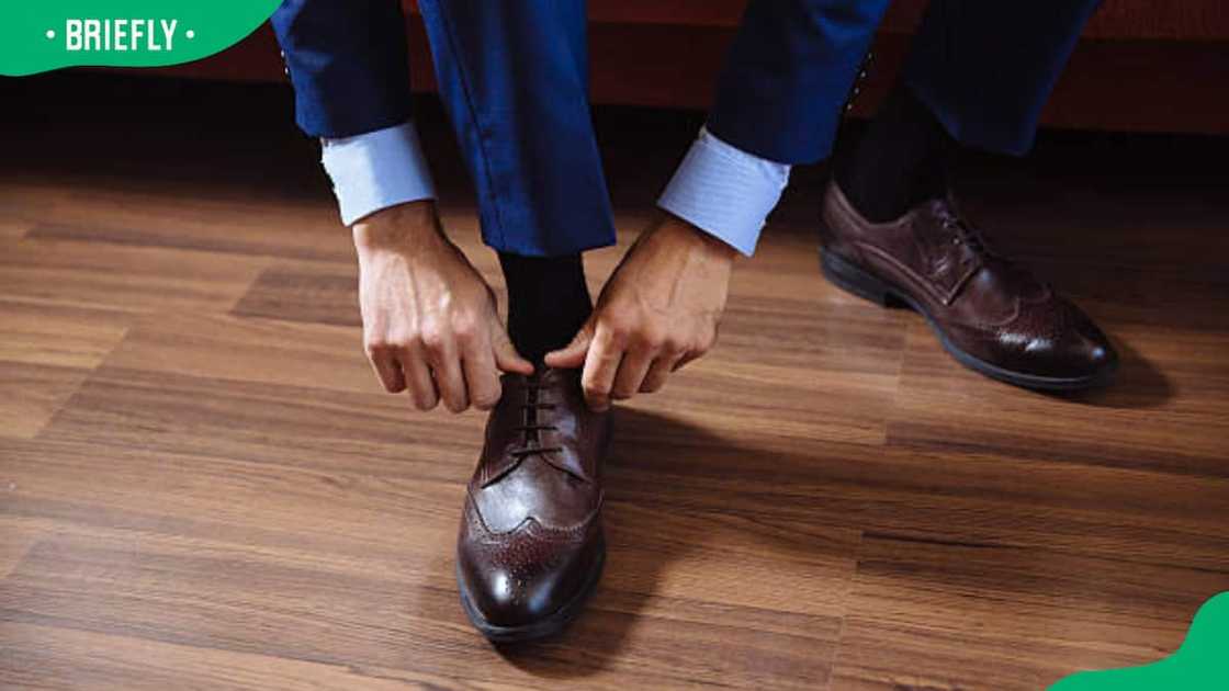 A business man dressing up with classic, elegant shoes.