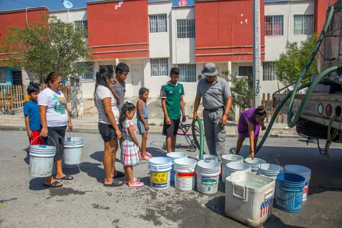 Residents of the northern Mexican city Monterrey queue for drinking water delivered by a tanker truck Residents of the northern Mexican city Monterrey queue for drinking water delivered by a tanker truck