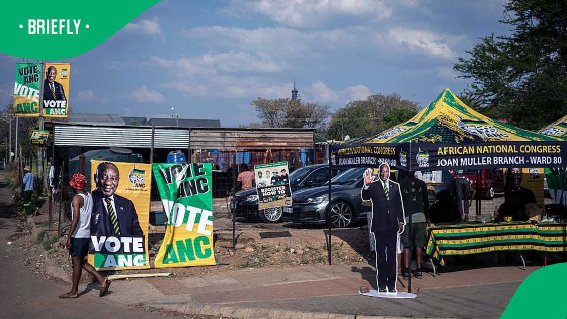 A cardboard cutout board of African National Congress (ANC) president Cyril Ramaphosa welcomes residents as ANC officials interact with voters in a residential neighborhood on September 26, 2026 in Tshwane, South Africa