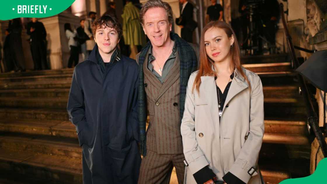 Damian Lewis and his kids Gulliver McCrory-Lewis and Manon McCrory-Lewis at the Burberry Winter 2025 show during London Fashion Week Damian Lewis and his kids Gulliver McCrory-Lewis and Manon McCrory-Lewis at the Burberry Winter 2025 show during London Fashion Week