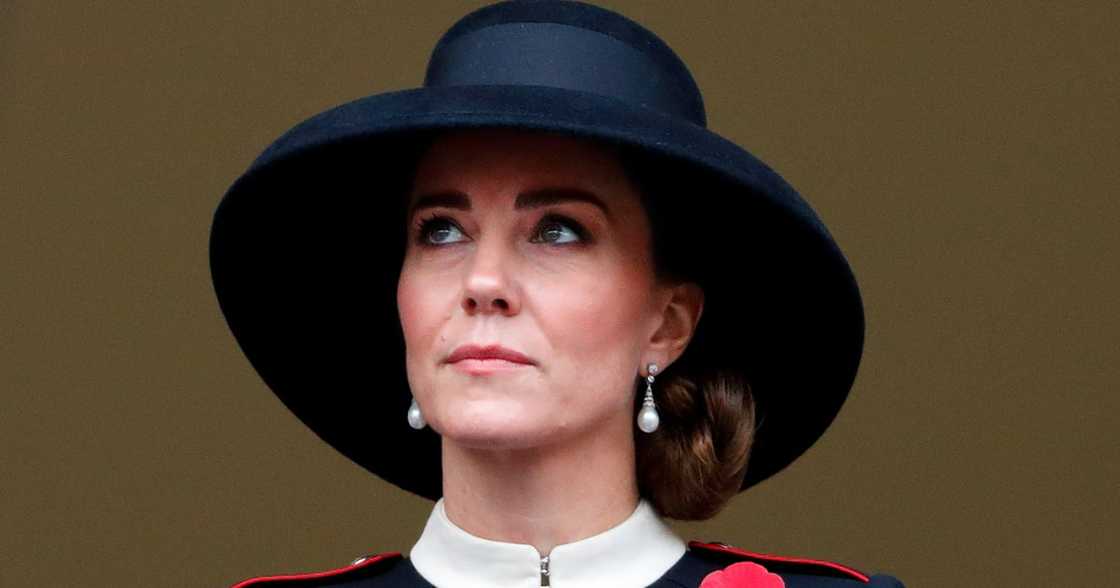 Duchess Kate Middleton, Princess Diana, pearl earrings, Alexander McQueen coat, black hat