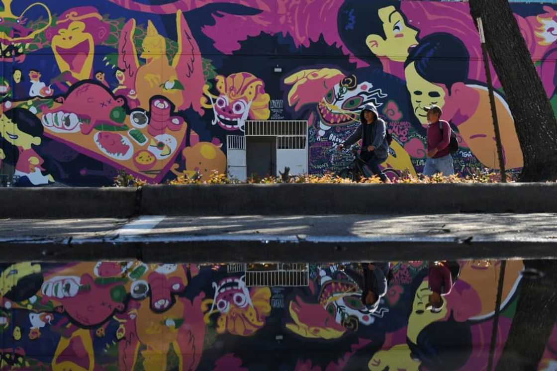 People walk around Chinatown in Houston, Texas on February 9, 2023 People walk around Chinatown in Houston, Texas on February 9, 2023