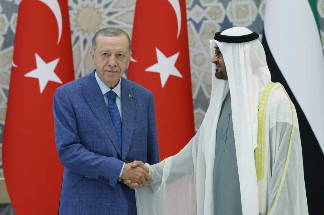 UAE President Mohamed bin Zayed Al Nahyan (R) greeting Turkey's President Recep Tayyip Erdogan UAE President Mohamed bin Zayed Al Nahyan (R) greeting Turkey's President Recep Tayyip Erdogan