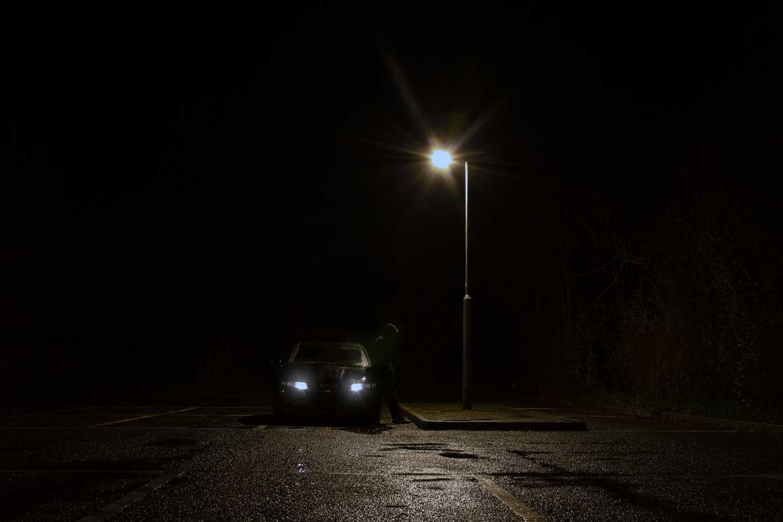 A car under a street light
