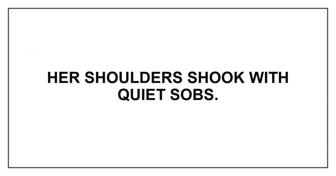 Her shoulders shook with quiet sobs.