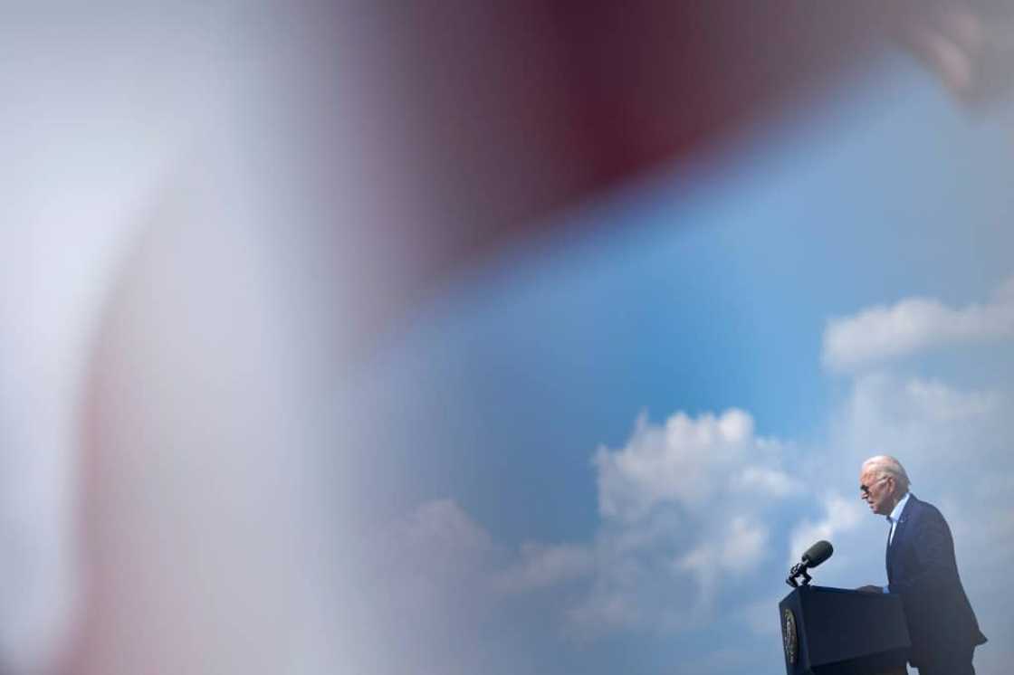 US President Joe Biden delivers remarks at the former location of the Brayton Point Power Station in Somerset, Massachussets, on July 20, 2022, warning that climate change represents a "clear and present danger" to the nation US President Joe Biden delivers remarks at the former location of the Brayton Point Power Station in Somerset, Massachussets, on July 20, 2022, warning that climate change represents a "clear and present danger" to the nation