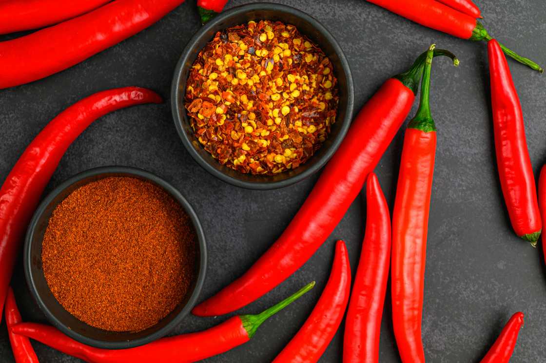 Rocomamas' spicy wing challlenge requires partcipants to eat the chillie poured over Rocomamas' spicy wing challlenge requires partcipants to eat the chillie poured over