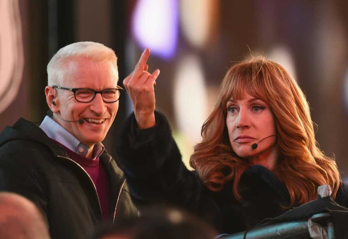 Anderson Cooper, seen here in 2016 with Kathy Griffin, has been a boozy ficture on CNN's New Year's Eve playbill for years