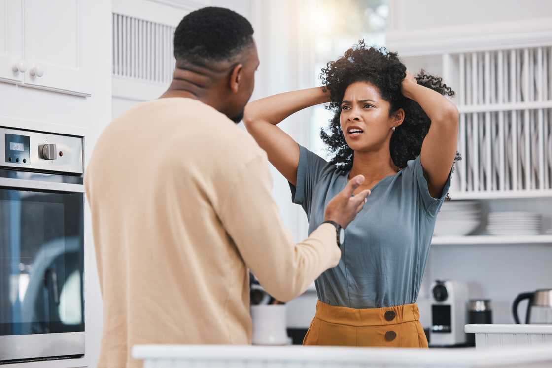 A couple fights in the kitchen. A couple fights in the kitchen.