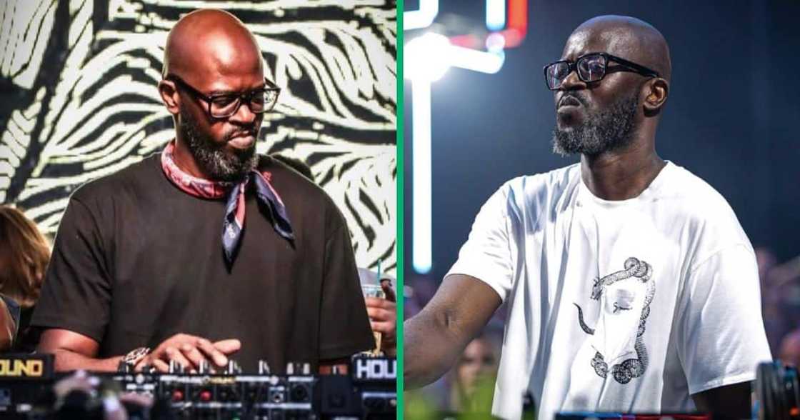 DJ Black Coffee with a model on stage DJ Black Coffee with a model on stage