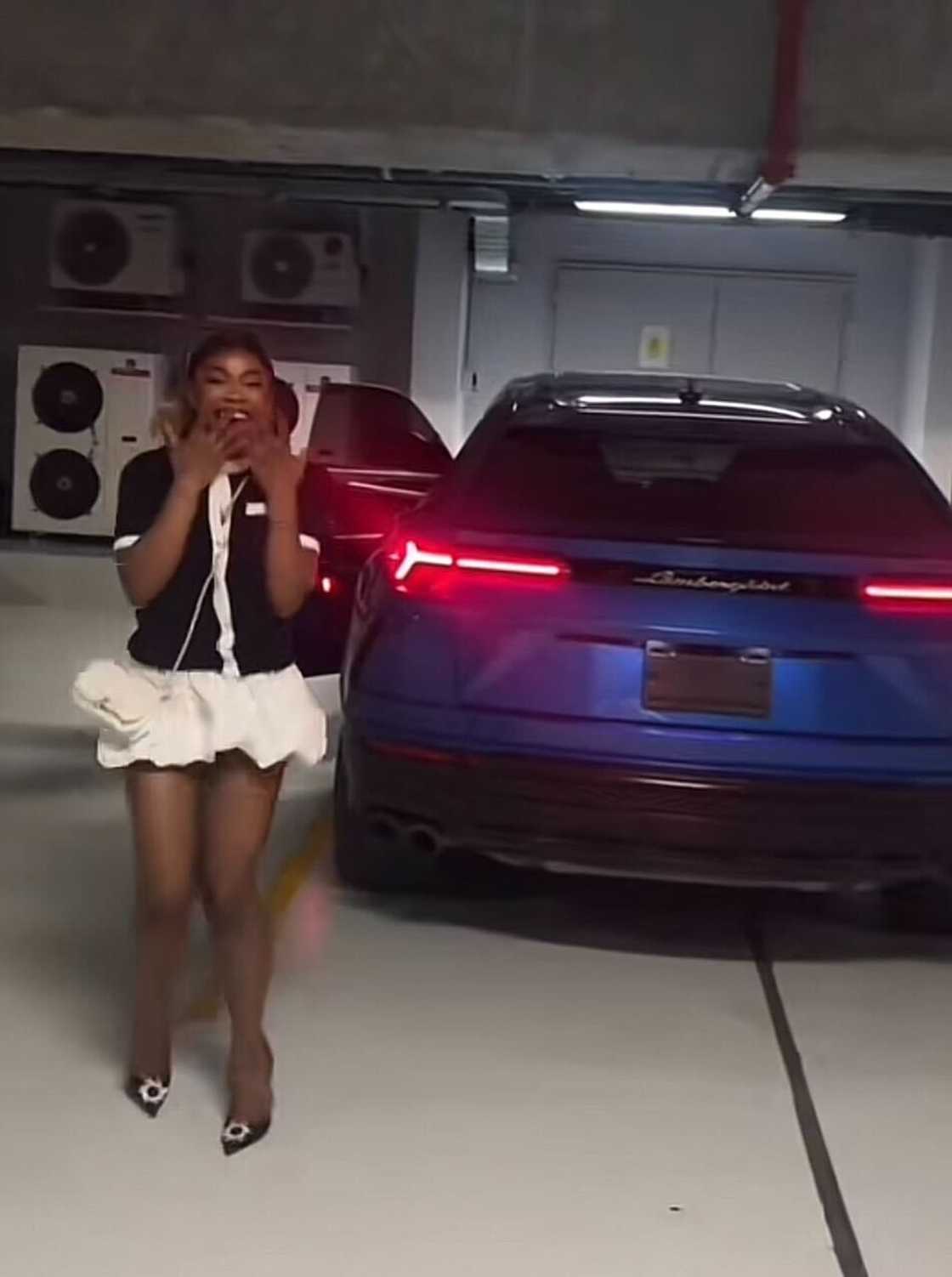 A woman was surprised with a stunning Lamborghini Urus. A woman was surprised with a stunning Lamborghini Urus.