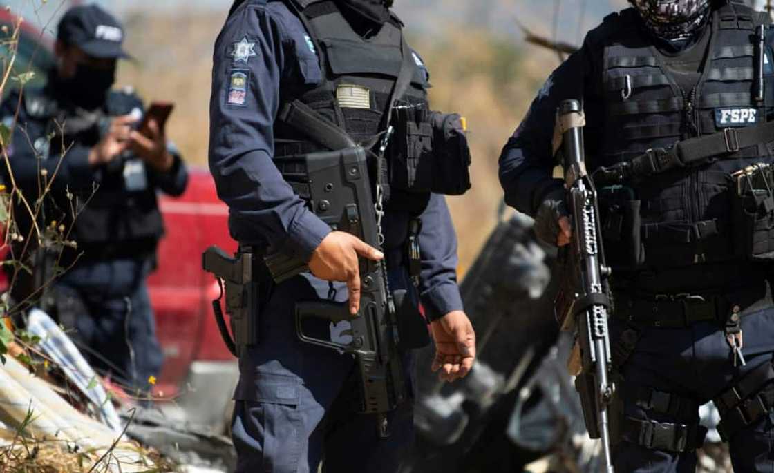 Police protect members of the 'Hasta Encontrarte' (Until we find you) collective searching for missing relatives in Mexico's Guanajuato state Police protect members of the 'Hasta Encontrarte' (Until we find you) collective searching for missing relatives in Mexico's Guanajuato state