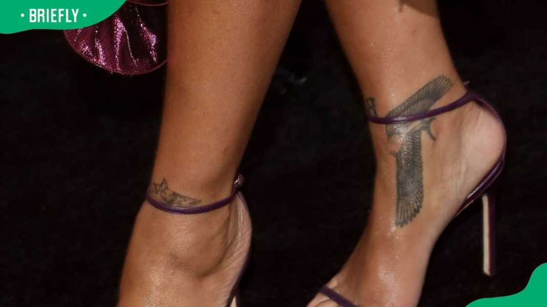 Rihanna's previous shark tattoo Rihanna's previous shark tattoo
