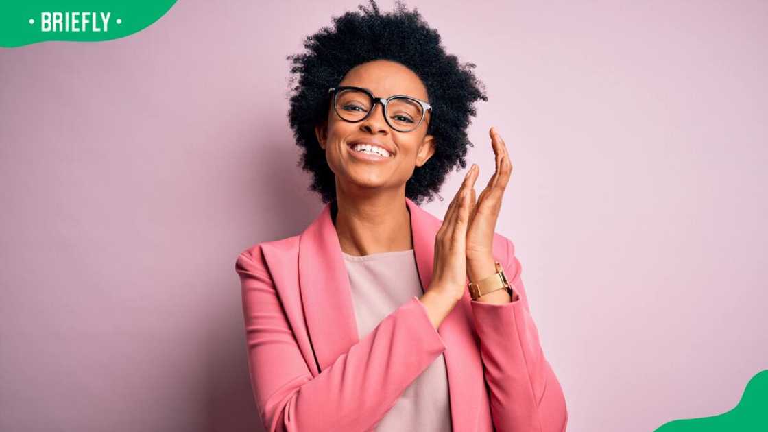 A woman clapping her hands