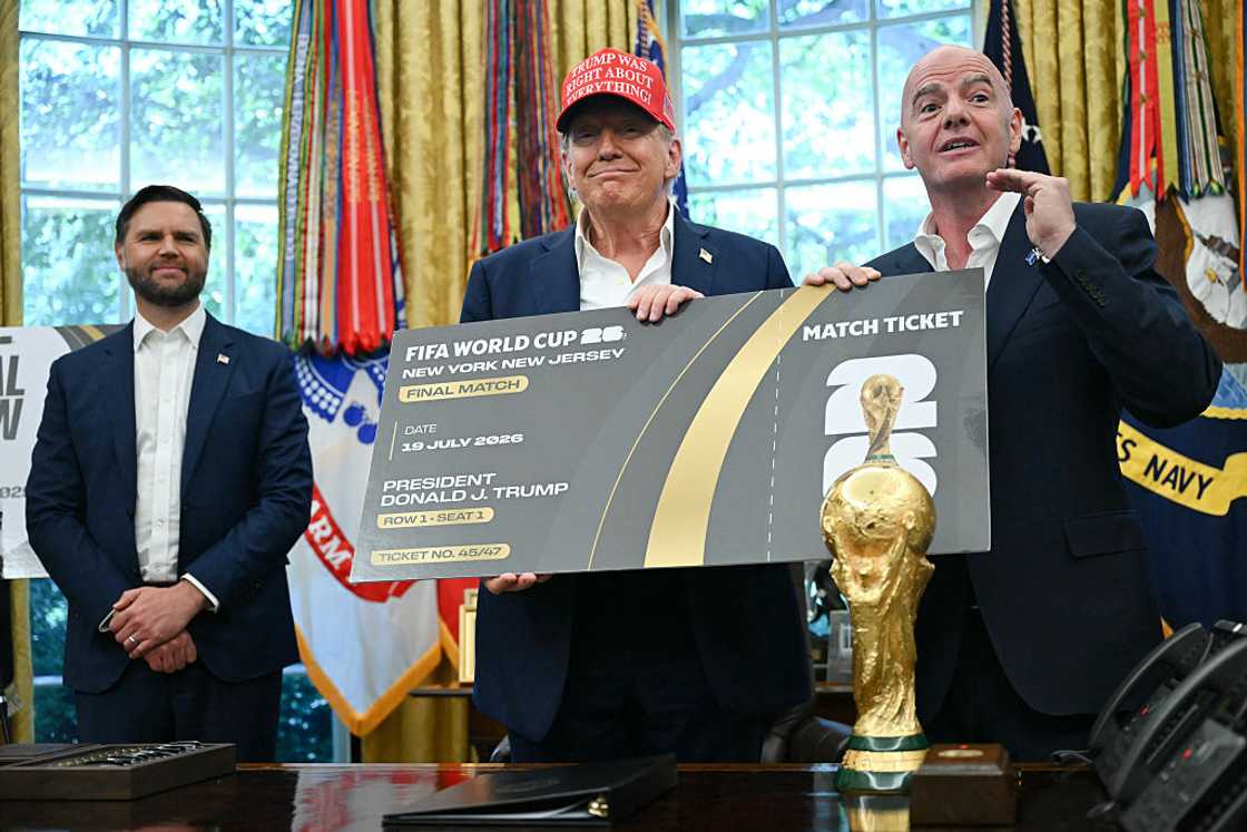 Image of US President Donald Trump being given a FIFA World Cup final ticket