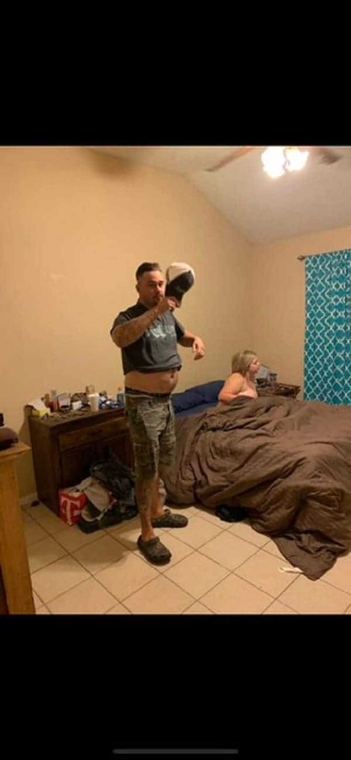 Man catches wife in bed with another man; shares their photos Man catches wife in bed with another man; shares their photos
