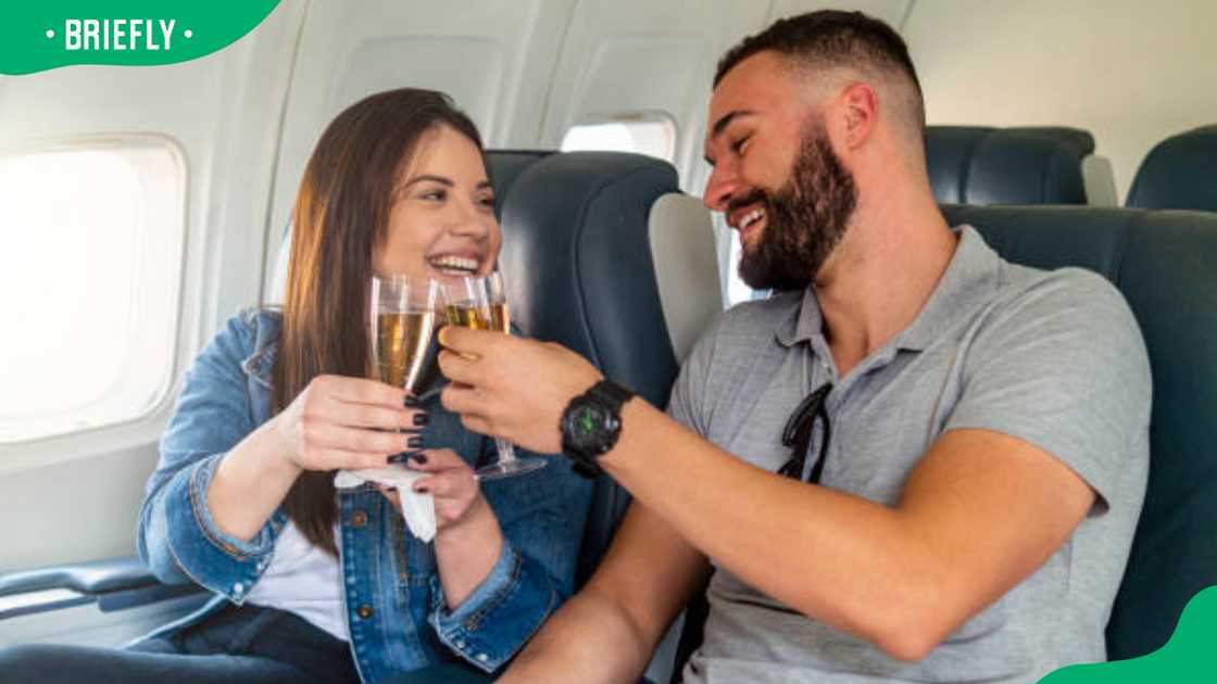 A couple toasting champagne