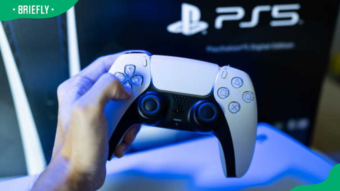 Gamer playing PlayStation 5 game Gamer playing PlayStation 5 game