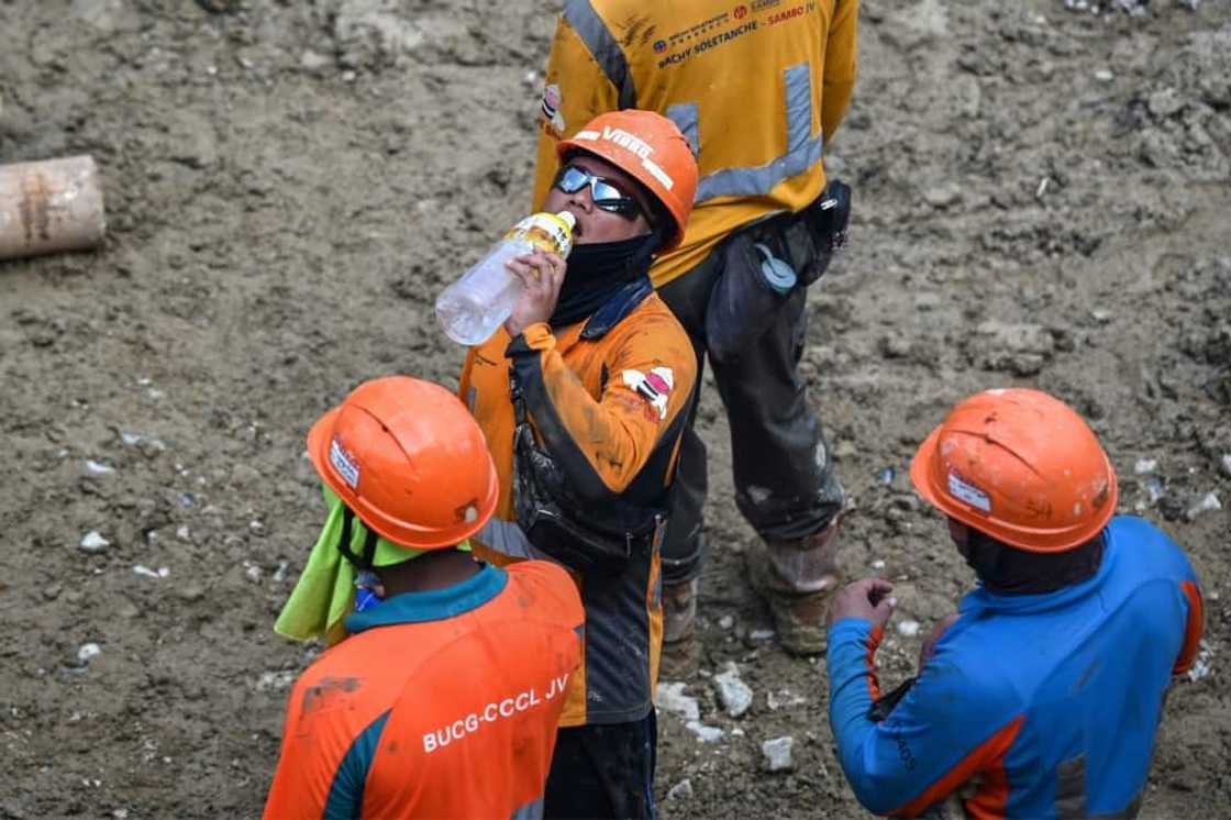 Hong Kong's government has advised employers to let workers take longer breaks on hot days, but there are no legal repercussions for those who do not Hong Kong's government has advised employers to let workers take longer breaks on hot days, but there are no legal repercussions for those who do not