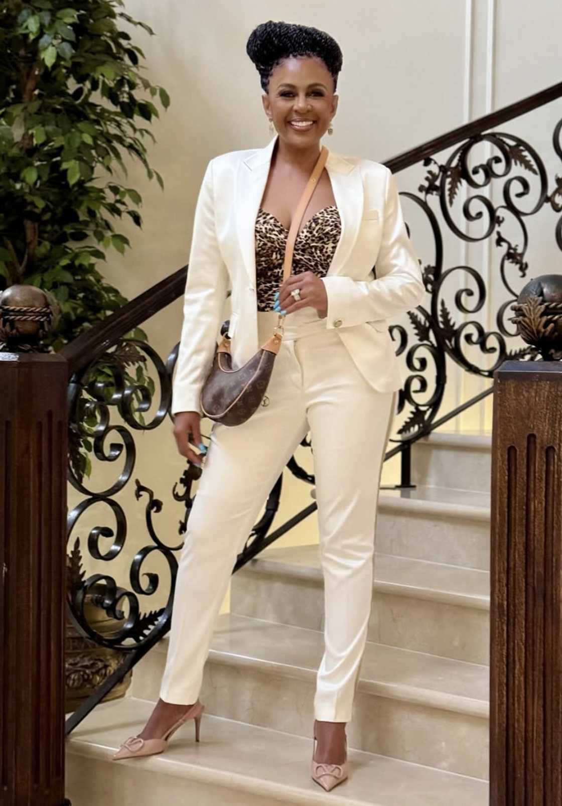 Basetsana Kumalo showed off her designer handbag Basetsana Kumalo showed off her designer handbag