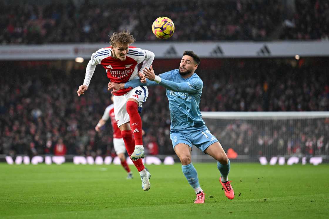 Martin Odegaard and Alex Moreno at Emirates Stadium