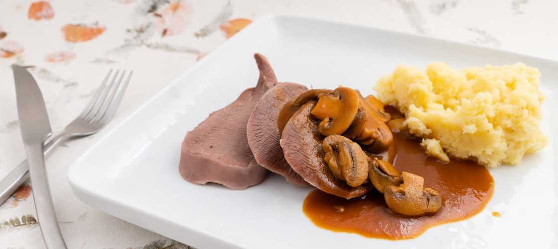 Beef tongue and mushrooms