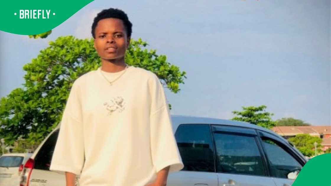 Lady plays soccer against boys