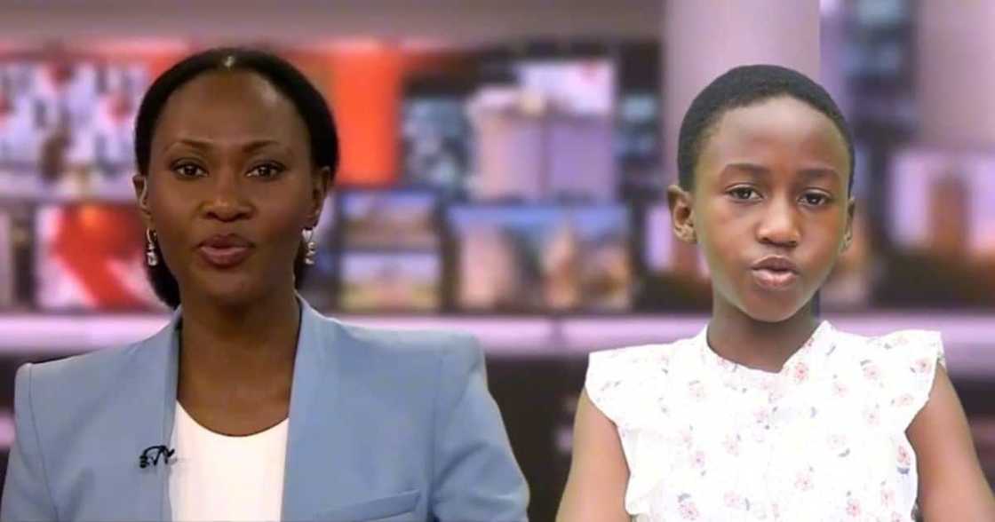 A young girl copied a professional news anchor A young girl copied a professional news anchor