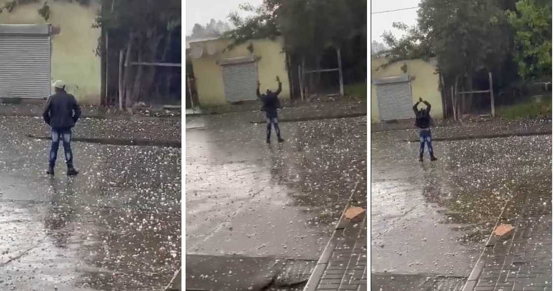 A gent stood in the middle of a massive hailstorm. A gent stood in the middle of a massive hailstorm.