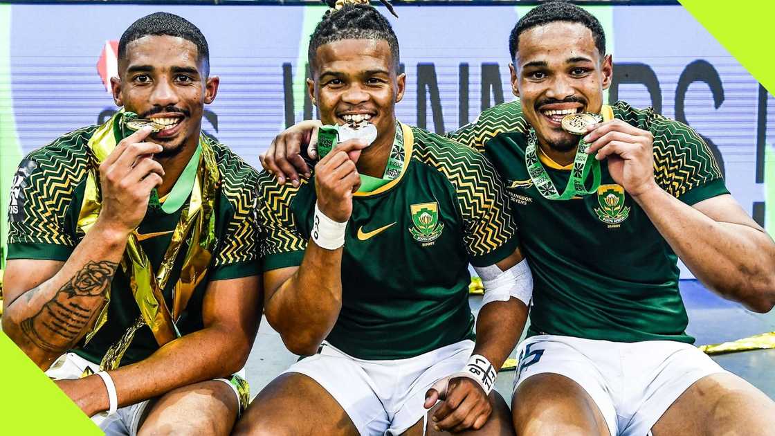 The Blitzboks show off their medals after winning the Cape Town Sevens Series.