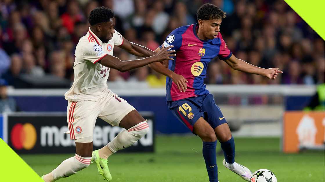 Barcelona's Lamine Yamal tries to go past Bayern Munich defender Alphonso Davies.