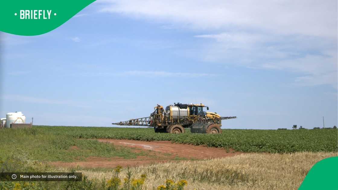 A tractor on a farm. A tractor on a farm.