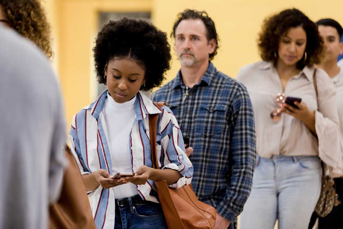 A queue inside a post office. A queue inside a post office.