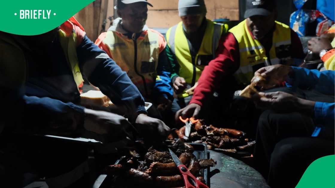 People enjoying food. People enjoying food.