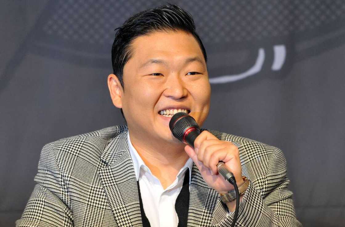 Psy speaks during a press conference in Seoul on 25 September 2012.