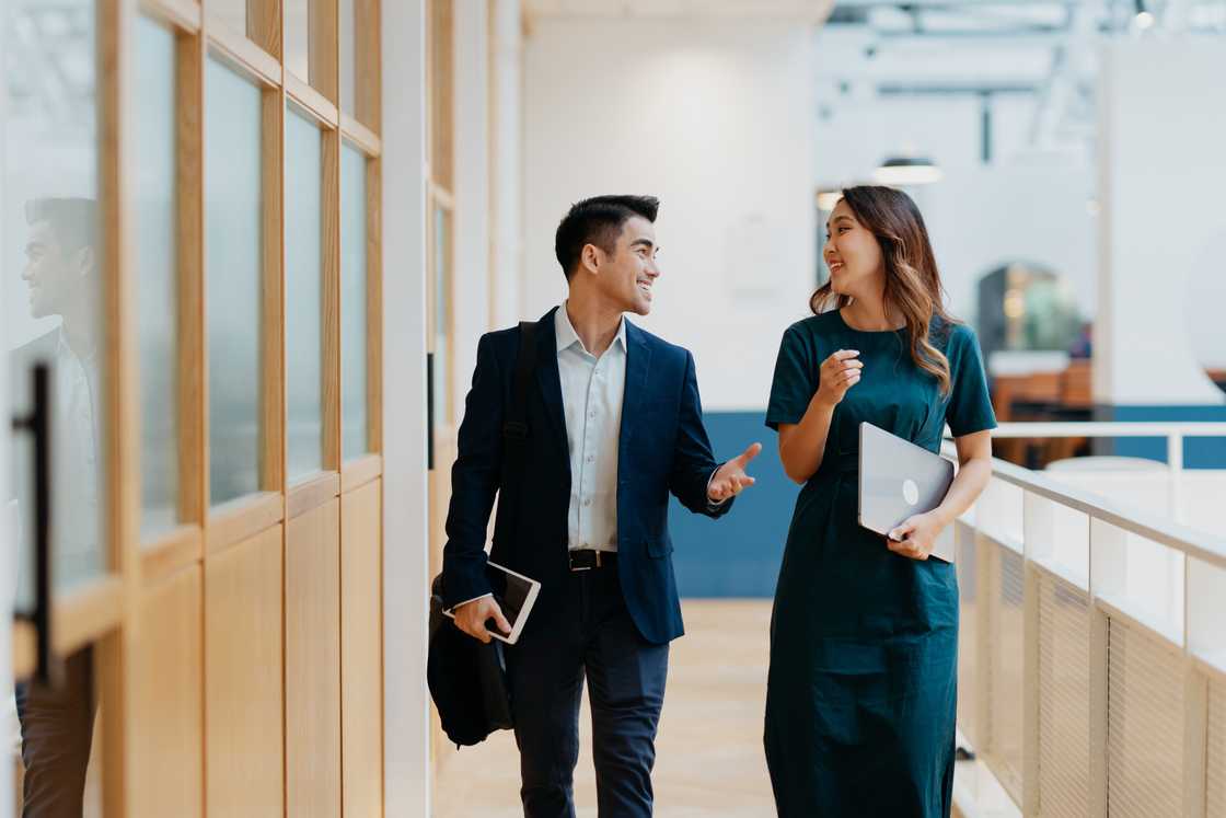 Two workers in a modern office