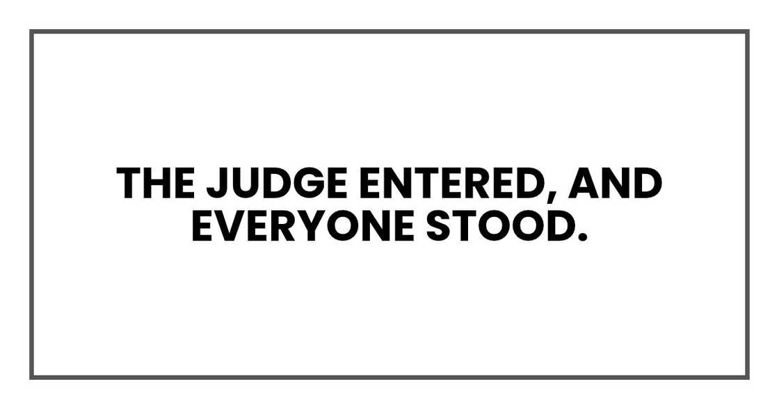 The judge entered, and everyone stood.