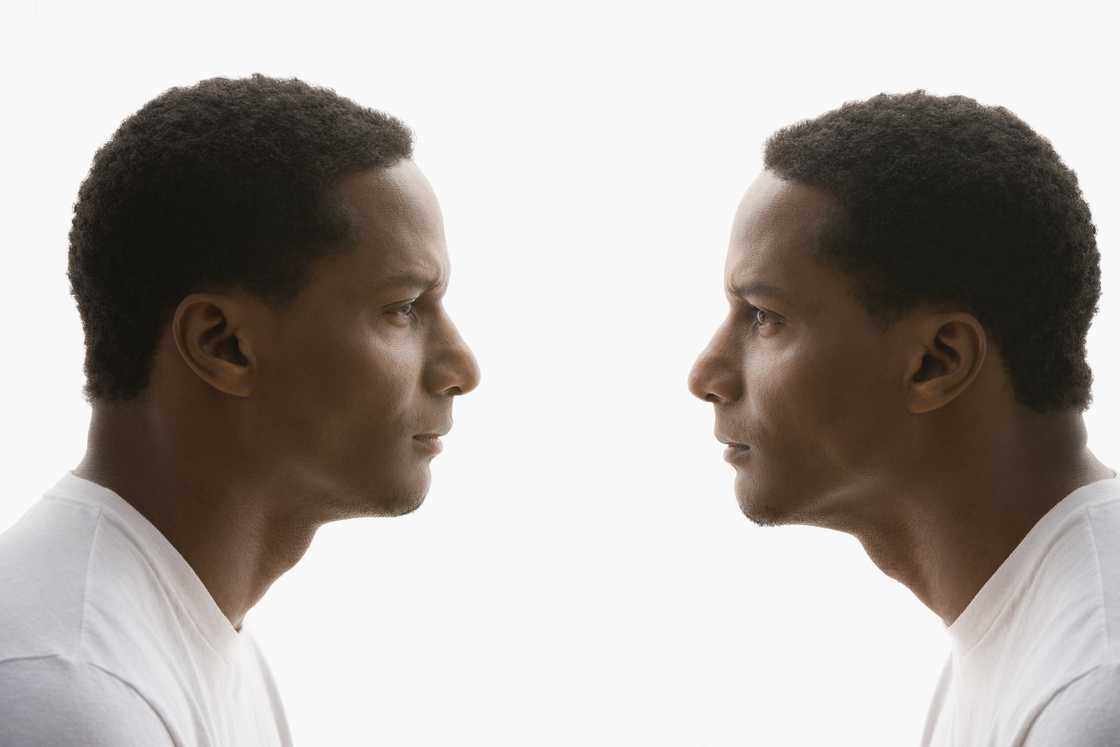 Two brothers face each other.