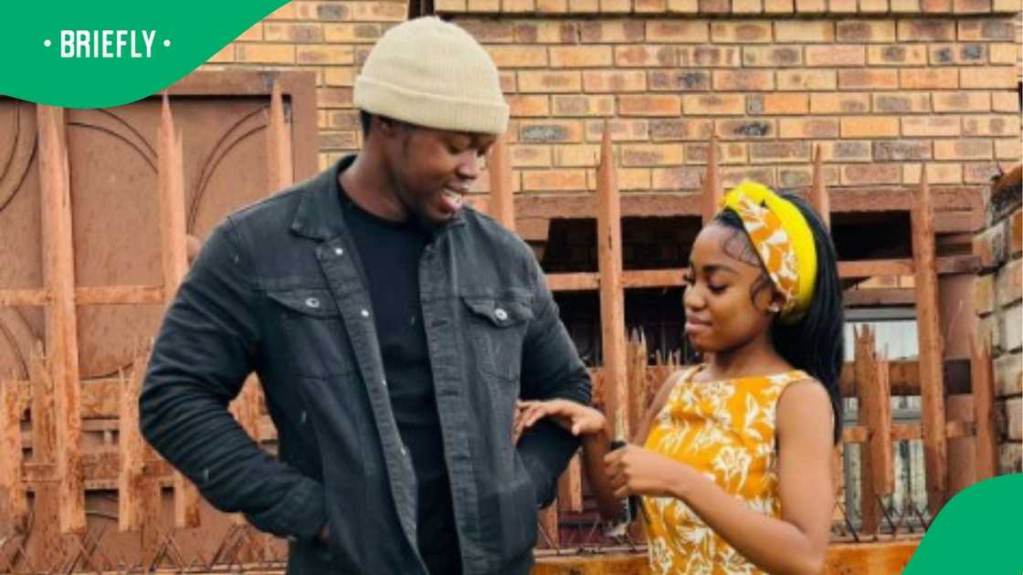 Young couple celebrates buying new house Young couple celebrates buying new house