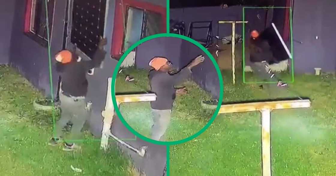 Men stealing solar panels Men stealing solar panels