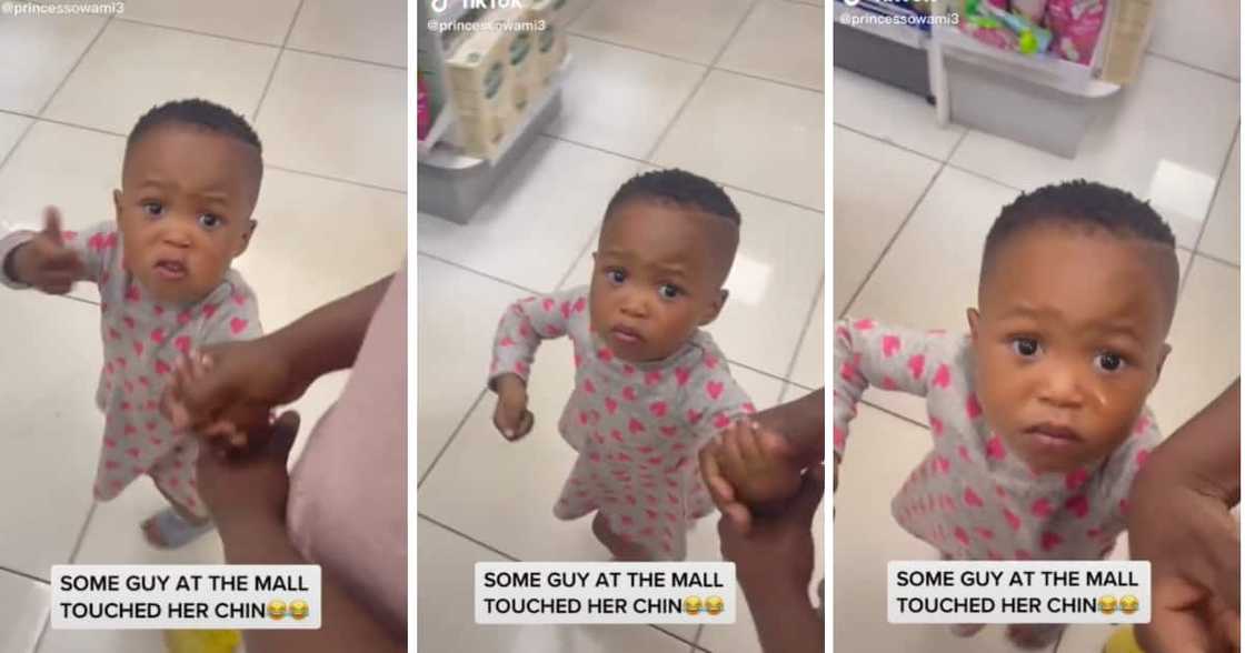 A toddler got annoyed with a stranger who randomly touched her chin. A toddler got annoyed with a stranger who randomly touched her chin.