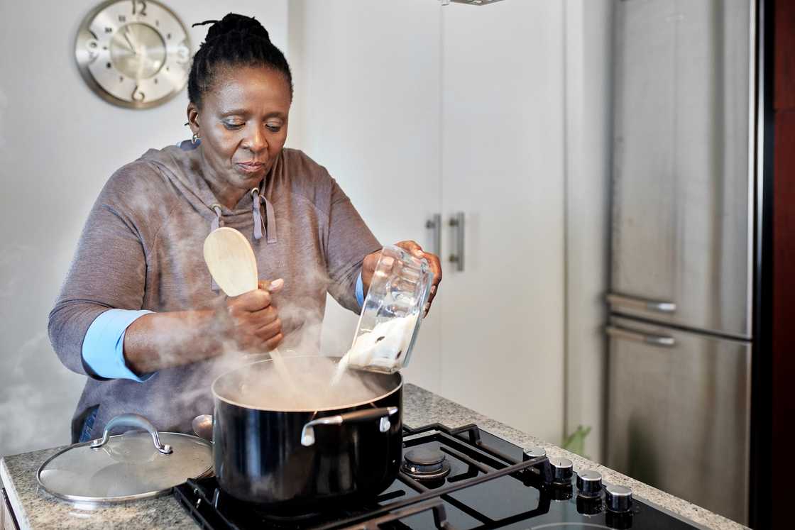 Pap is typically prepared with a wooden spoon