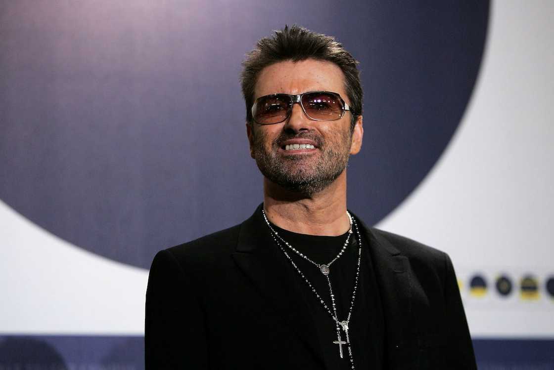 George Michael poses at the George Michael: A Different Story photocall George Michael poses at the George Michael: A Different Story photocall