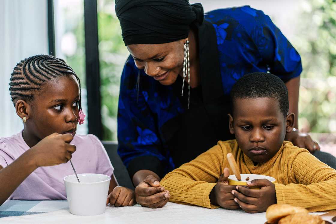 A black mother and her children