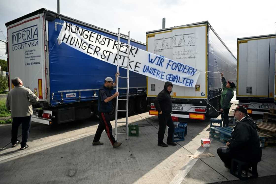 They are demanding 500,000 euros ($530,000) in what they say are unpaid wages They are demanding 500,000 euros ($530,000) in what they say are unpaid wages