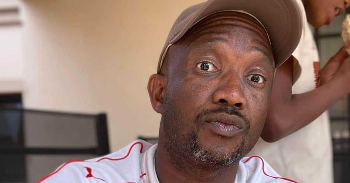 David Kau's bank wants to repossess his house David Kau's bank wants to repossess his house