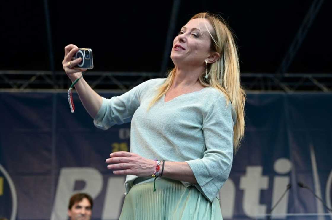 Giorgia Meloni's Brothers of Italy party is leading opinion polls ahead of September elections Giorgia Meloni's Brothers of Italy party is leading opinion polls ahead of September elections