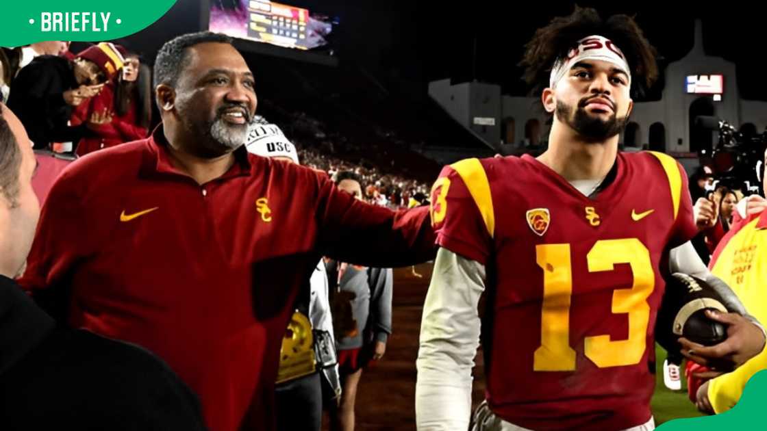 Caleb Williams #13 of the USC Trojans with his father during an NCAA football game