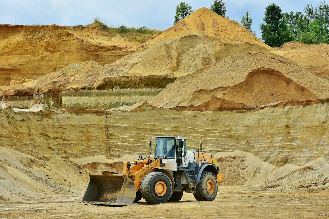 A front-end loader in a mining site A front-end loader in a mining site